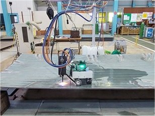 報告：柴原研究室とジャパンマリンユナイテッドで開発中の「AI×線状加熱ロボット」が「AI NEXT FORUM 2023」にて公開！